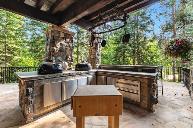 165 River Park Dr, Breckenridge, CO 80424 - view of patio featuring an outdoor kitchen