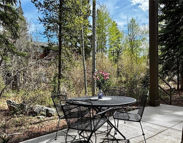 231 Creekside Dr Unit 102, Frisco, CO 80443 - view of patio / terrace with outdoor dining space