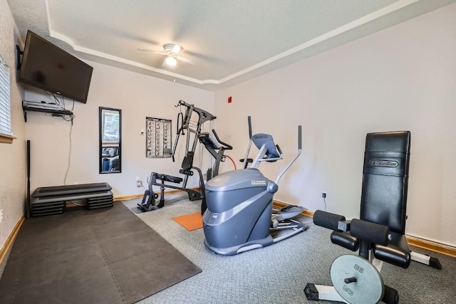 231 Creekside Dr Unit 102, Frisco, CO 80443 - workout room featuring ceiling fan, healthy amount of natural light, and a raised ceiling