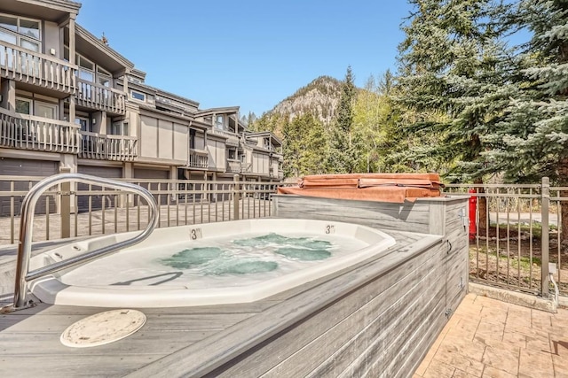 231 Creekside Dr Unit 102, Frisco, CO 80443 - wooden deck with a covered hot tub