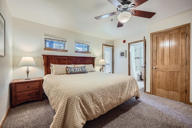 231 Creekside Dr Unit 102, Frisco, CO 80443 - carpeted bedroom with connected bathroom and a ceiling fan