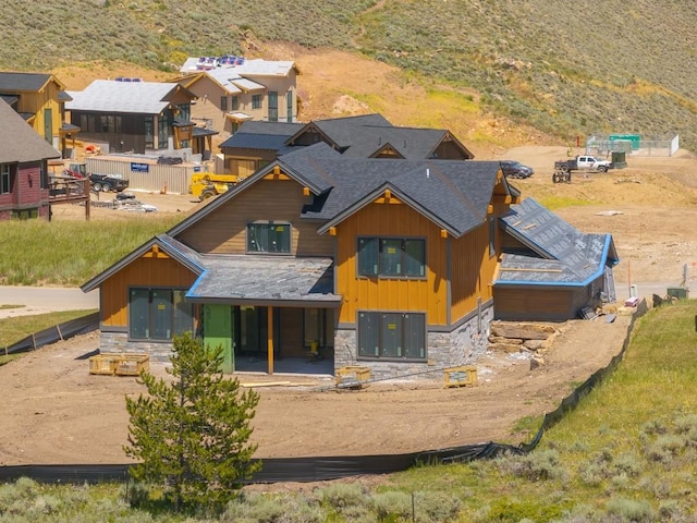 385 Lone Eagle Dr, Granby, CO 80446 - back of property with stone siding and board and batten siding