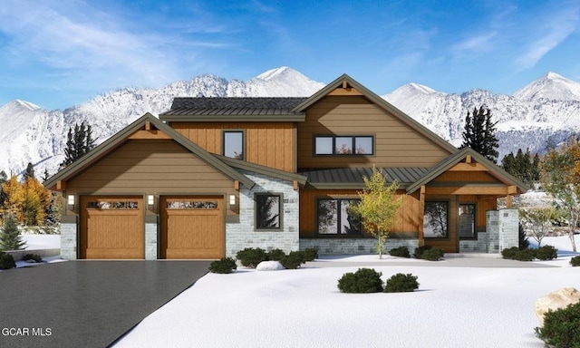 385 Lone Eagle Dr, Granby, CO 80446 - craftsman house with stone siding, a garage, driveway, and a mountain view