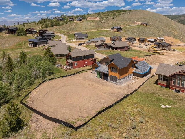 385 Lone Eagle Dr, Granby, CO 80446 - aerial view of residential area with a mountainous background