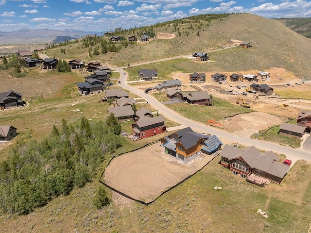 385 Lone Eagle Dr, Granby, CO 80446 - aerial view of property and surrounding area with a mountain backdrop and nearby suburban area
