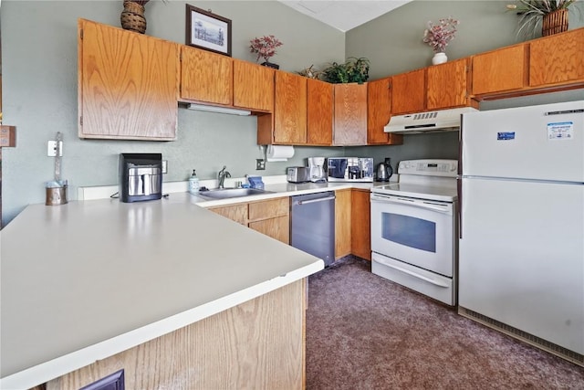 kitchen featuring a sink, white appliances, dark carpet, light countertops, and under cabinet range hood