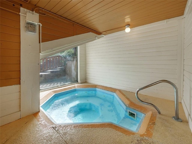 playroom featuring wooden walls, beam ceiling, pool table, and carpet floors
