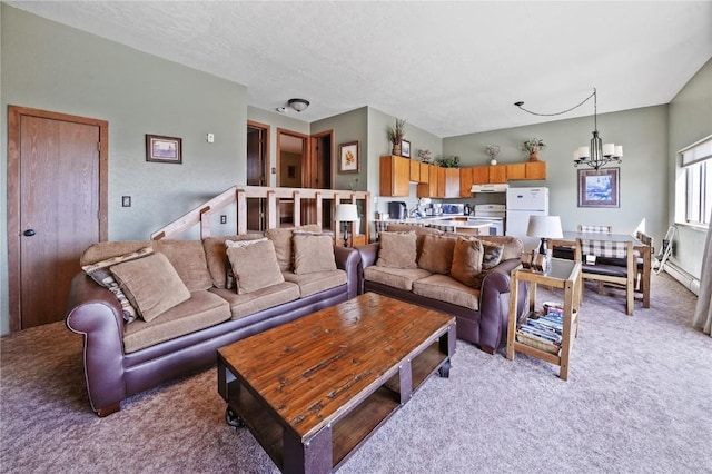 living room featuring an inviting chandelier and light colored carpet