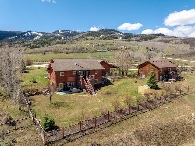 bird's eye view featuring a rural view and a mountain view