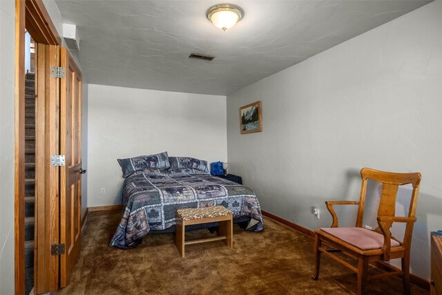 30225 Coyote Run Ct, Oak Creek, CO 80467 - carpeted bedroom featuring visible vents and baseboards