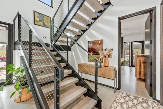 582 Laurel St, Steamboat Springs, CO 80487 - staircase with plenty of natural light and finished concrete flooring