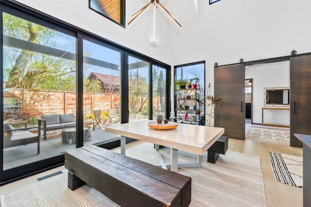 582 Laurel St, Steamboat Springs, CO 80487 - sunroom / solarium featuring healthy amount of natural light and a barn door