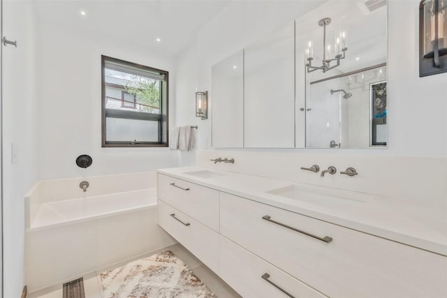582 Laurel St, Steamboat Springs, CO 80487 - full bath featuring a stall shower, double vanity, a bath, and tile patterned flooring