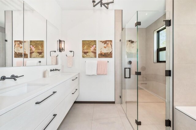 582 Laurel St, Steamboat Springs, CO 80487 - full bathroom featuring a shower stall, double vanity, and tile patterned floors