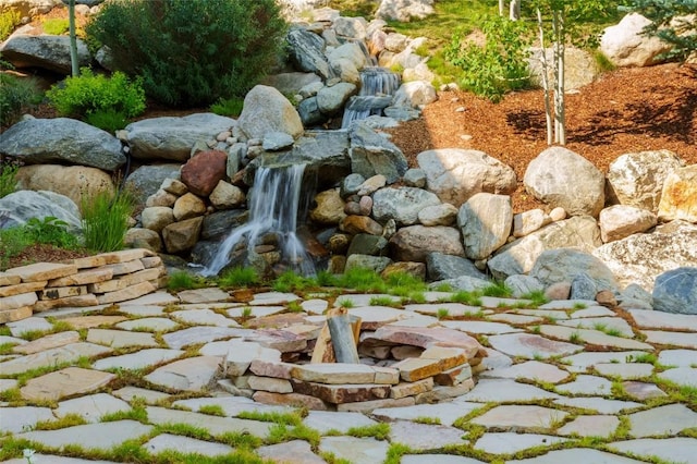 1511 Harwig Cir, Steamboat Springs, CO 80487 - details with a small pond and an outdoor fire pit