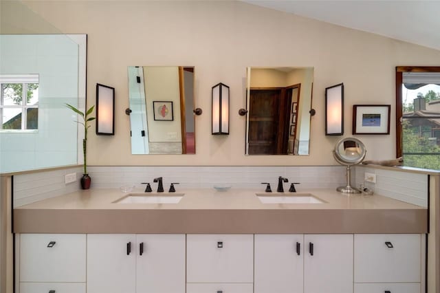 1511 Harwig Cir, Steamboat Springs, CO 80487 - bathroom featuring double vanity, a wealth of natural light, and a sink
