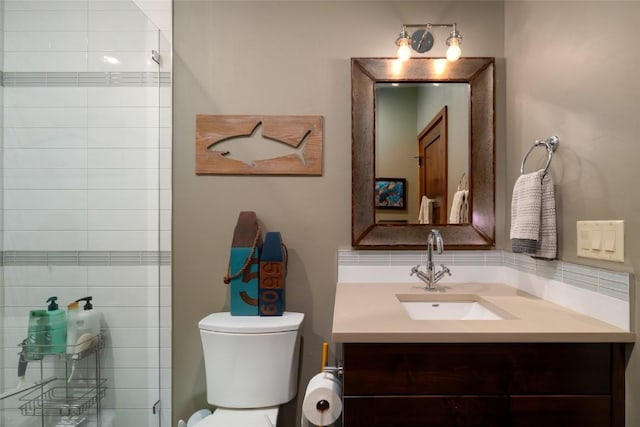 1511 Harwig Cir, Steamboat Springs, CO 80487 - full bathroom featuring vanity, a tile shower, and toilet
