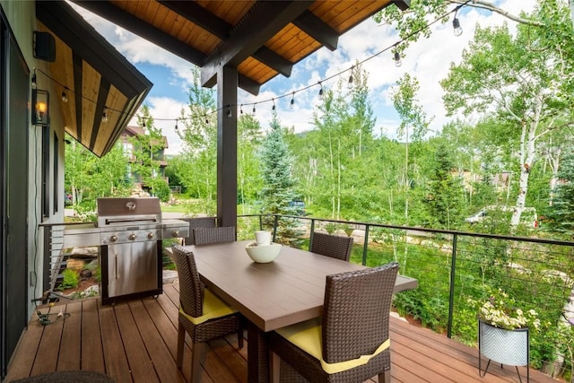 1511 Harwig Cir, Steamboat Springs, CO 80487 - wooden terrace with area for grilling and outdoor dining area