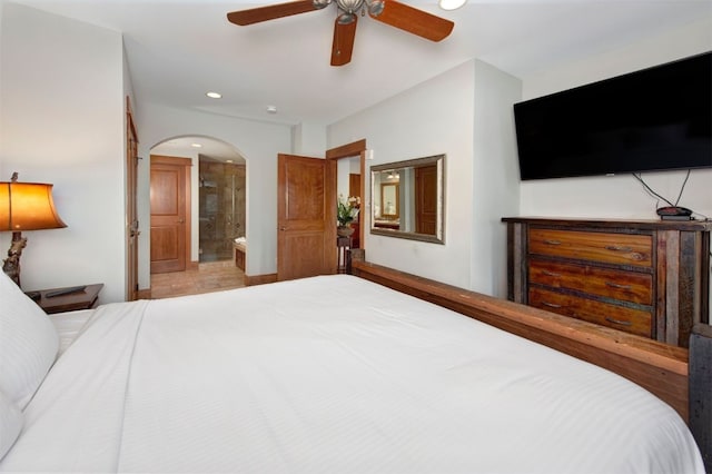 280 Trailhead Dr Unit 3037, Keystone, CO 80435 - bedroom with connected bathroom, arched walkways, a ceiling fan, and recessed lighting