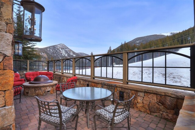 280 Trailhead Dr Unit 3037, Keystone, CO 80435 - view of patio / terrace featuring an outdoor fire pit and a mountain view