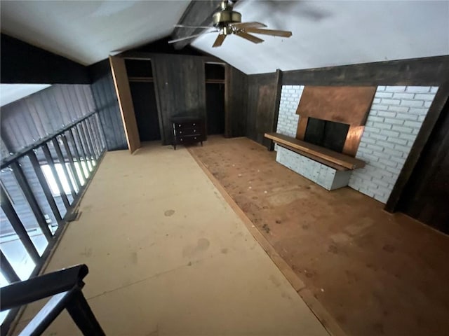 810 Broad St, Steamboat Springs, CO 80487 - bonus room with vaulted ceiling, ceiling fan, and a brick fireplace