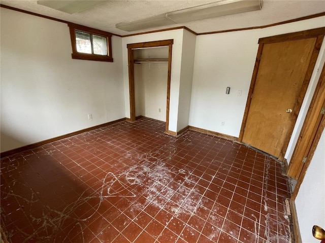 810 Broad St, Steamboat Springs, CO 80487 - unfurnished bedroom featuring baseboards and a closet