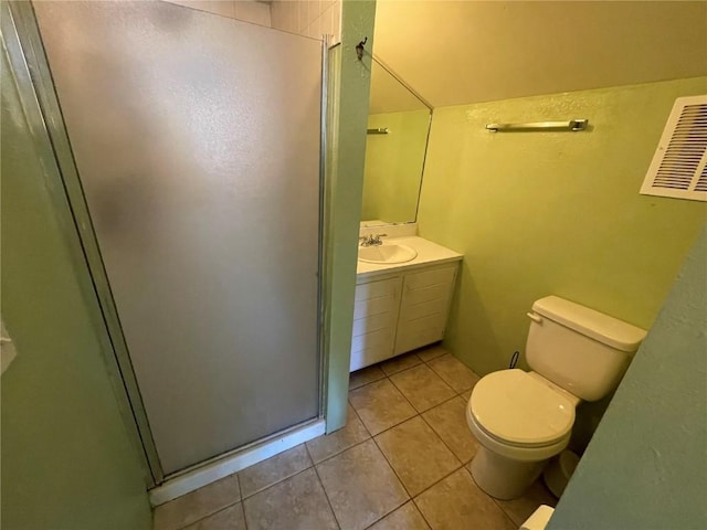 810 Broad St, Steamboat Springs, CO 80487 - full bathroom featuring tile patterned floors, toilet, a stall shower, and vanity