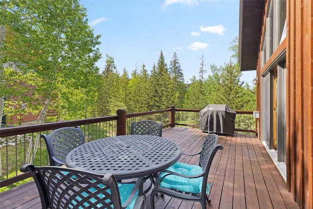 736 Wild Rose Rd, Silverthorne, CO 80498 - wooden deck featuring area for grilling and outdoor dining space