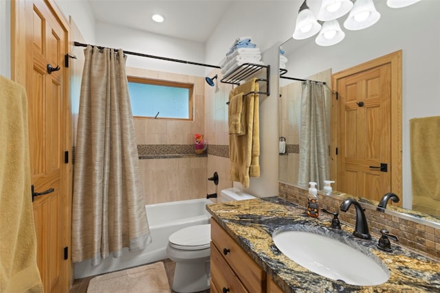 736 Wild Rose Rd, Silverthorne, CO 80498 - bathroom featuring vanity, shower / bathtub combination with curtain, and a chandelier