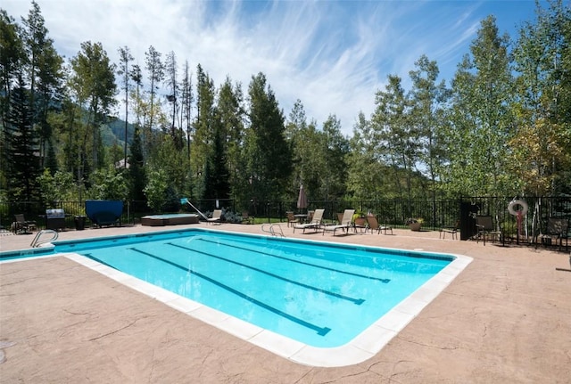 2883 Burgess Creek Rd Unit 101, Steamboat Springs, CO 80487 - pool with fence and a patio