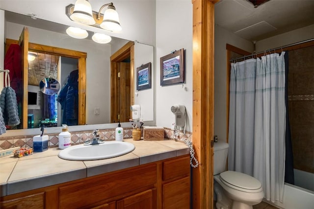 2883 Burgess Creek Rd Unit 101, Steamboat Springs, CO 80487 - full bathroom featuring toilet, vanity, and shower / bathtub combination with curtain
