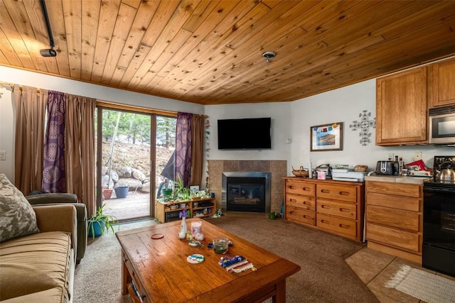 2883 Burgess Creek Rd Unit 101, Steamboat Springs, CO 80487 - carpeted living area featuring wood ceiling and a fireplace