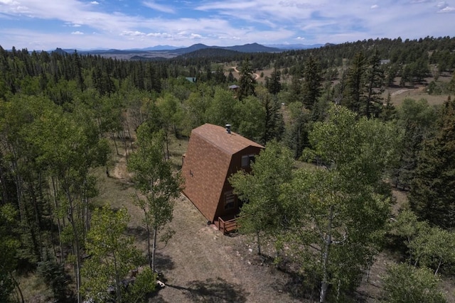 33 Sugar Loaf Ln, Jefferson, CO 80456 - drone / aerial view with a mountain view and a wooded view