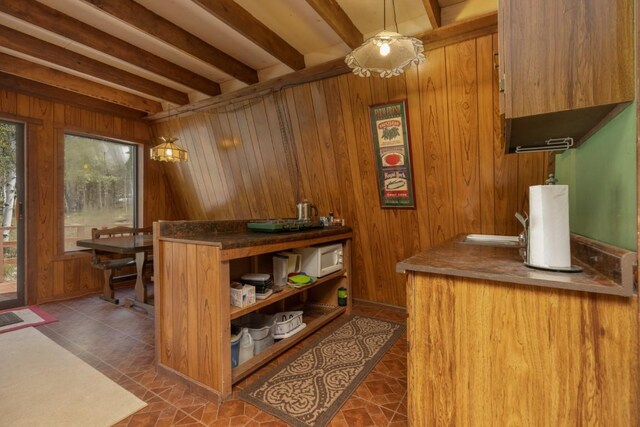 33 Sugar Loaf Ln, Jefferson, CO 80456 - bar featuring beamed ceiling and wooden walls