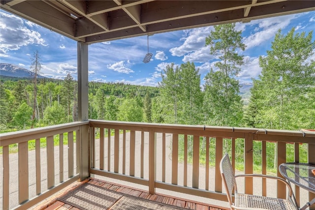 2510 Ryan Gulch Rd Unit 2512, Silverthorne, CO 80498 - wooden terrace with a wooded view