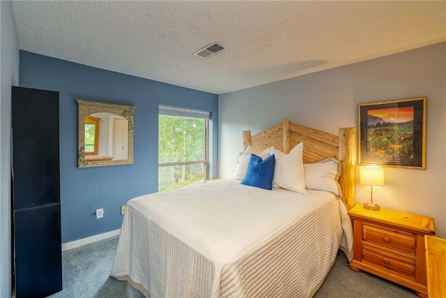 2510 Ryan Gulch Rd Unit 2512, Silverthorne, CO 80498 - carpeted bedroom with a textured ceiling and baseboards
