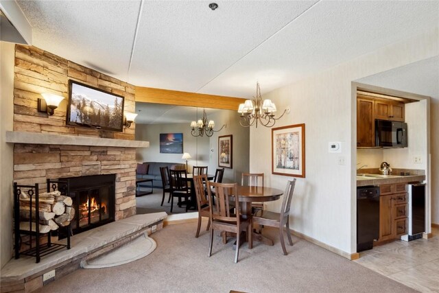 640 Village Rd Unit 4423, Breckenridge, CO 80424 - dining area featuring a fireplace, a textured ceiling, baseboards, and light carpet