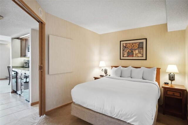 640 Village Rd Unit 4423, Breckenridge, CO 80424 - bedroom with a textured ceiling and baseboards