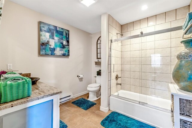 53 Anhinga Rd, Como, CO 80432 - full bath with tile patterned flooring, enclosed tub / shower combo, toilet, baseboards, and baseboard heating