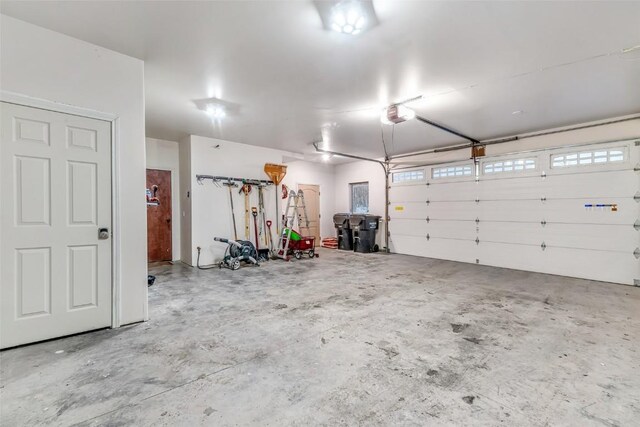 53 Anhinga Rd, Como, CO 80432 - garage featuring a garage door opener