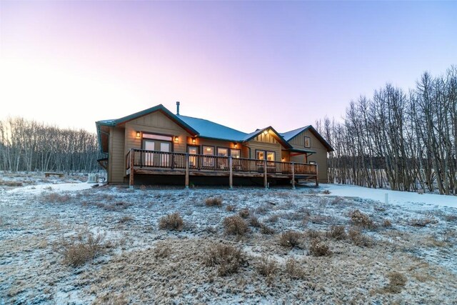 53 Anhinga Rd, Como, CO 80432 - snow covered property featuring board and batten siding and a deck