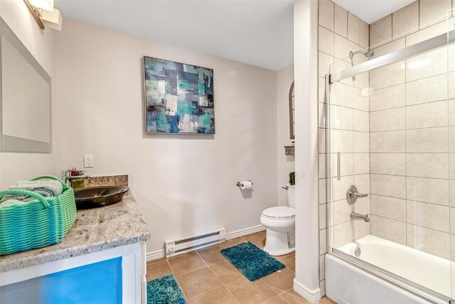 53 Anhinga Rd, Como, CO 80432 - full bathroom with a baseboard heating unit, shower / bath combination with glass door, toilet, baseboards, and tile patterned flooring