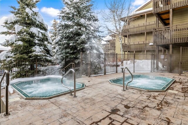 2700 Village Dr Unit C107, Steamboat Springs, CO 80487 - view of pool with a hot tub and a patio area