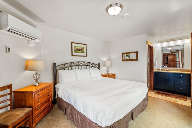 2700 Village Dr Unit C107, Steamboat Springs, CO 80487 - bedroom with an AC wall unit, light colored carpet, a sink, and ensuite bathroom
