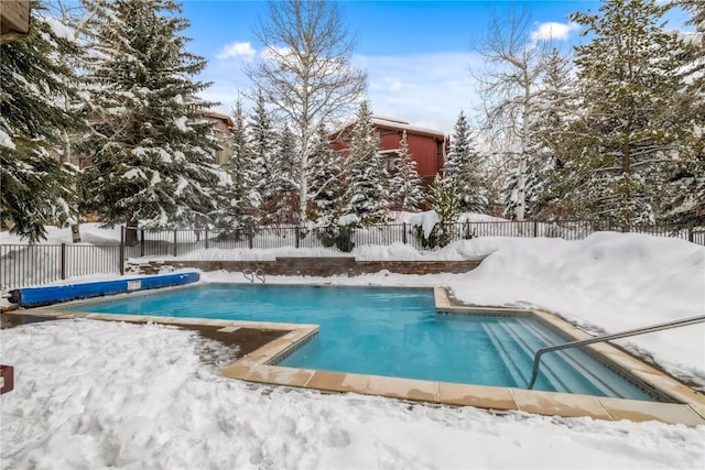 2700 Village Dr Unit C107, Steamboat Springs, CO 80487 - snow covered pool with a fenced backyard