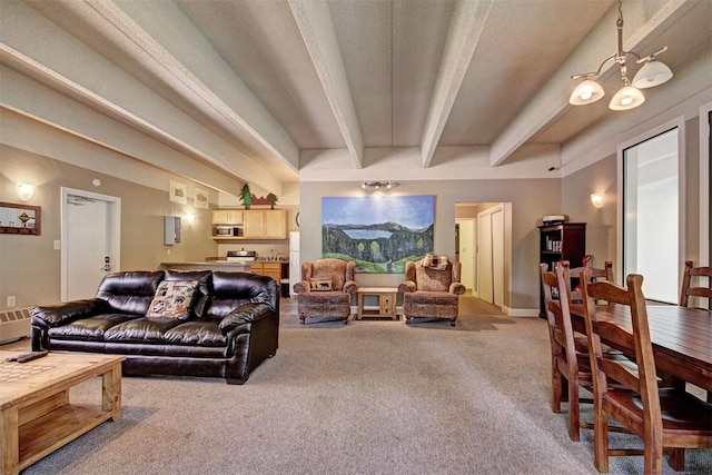 living area with carpet flooring and beam ceiling
