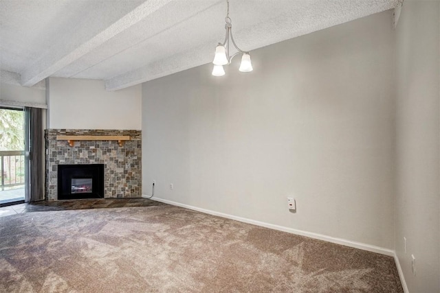unfurnished living room featuring baseboards, carpet flooring, a tile fireplace, and a textured ceiling