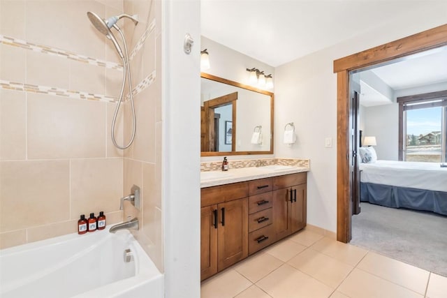 bathroom featuring shower / bathing tub combination, ensuite bathroom, vanity, and tile patterned flooring