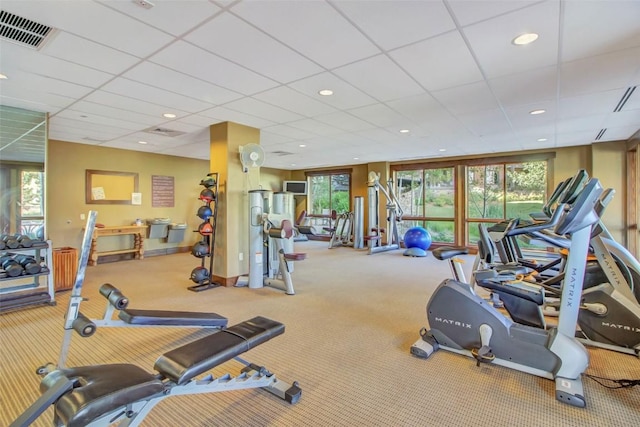 workout area featuring visible vents, carpet flooring, recessed lighting, and a drop ceiling