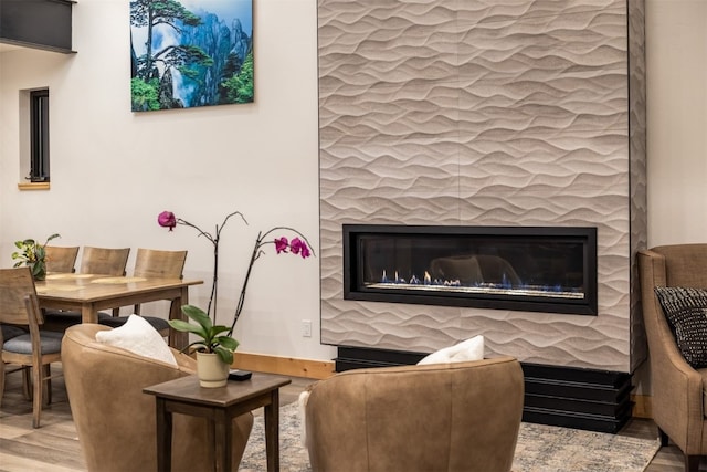 89 Wilderness Dr, Breckenridge, CO 80424 - living room featuring a glass covered fireplace and wood finished floors